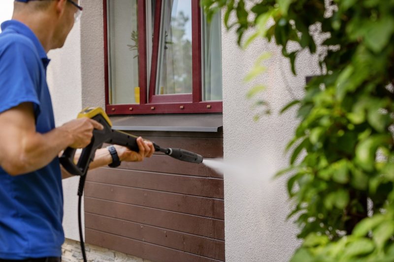 power washing the outside of a house