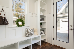 Functional new home design with built in white shelves.