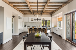 An open floor plan connecting dining room to kitchen in custom home. 