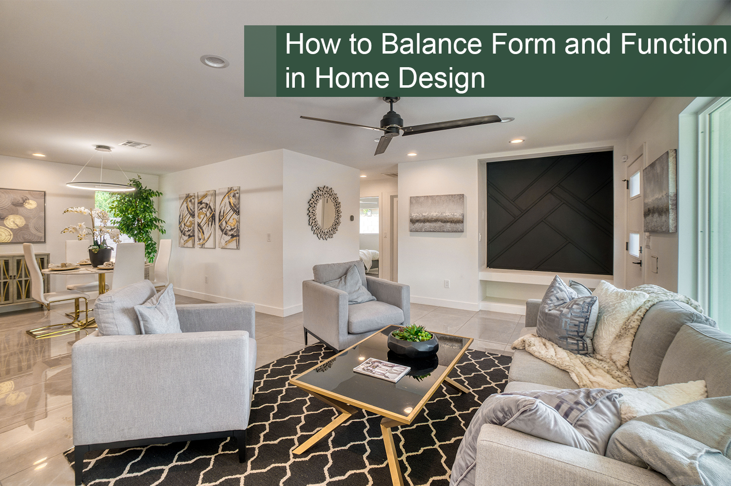 An open floor plan home design with white couches, a black rug, and green plants.