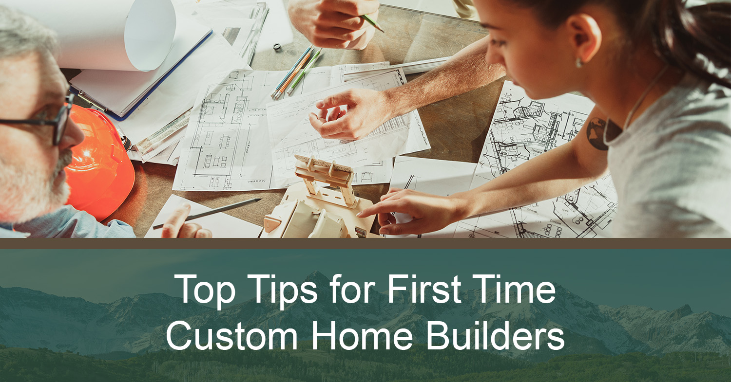 First-time home builders talking to their builder about their custom home plans.